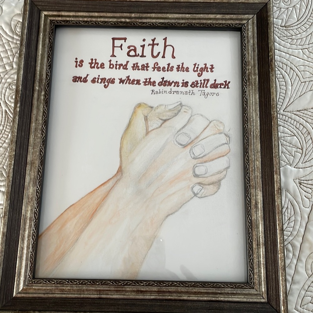 Hand drawn sketch of praying hands. Lightly watercolor shaded
